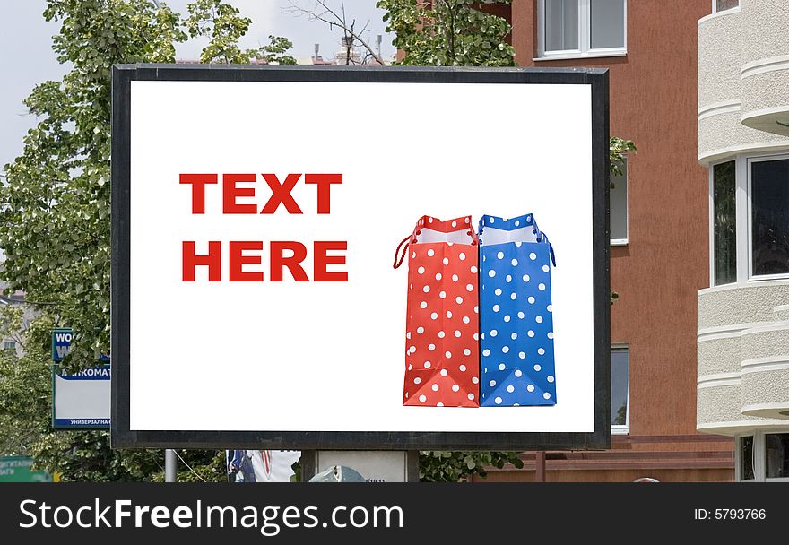 Blank billboard in city and shopping bags. Blank billboard in city and shopping bags