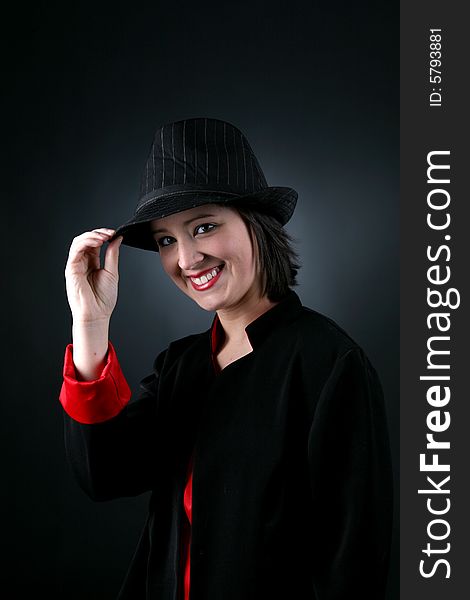 Happy teen in top hat and black and red