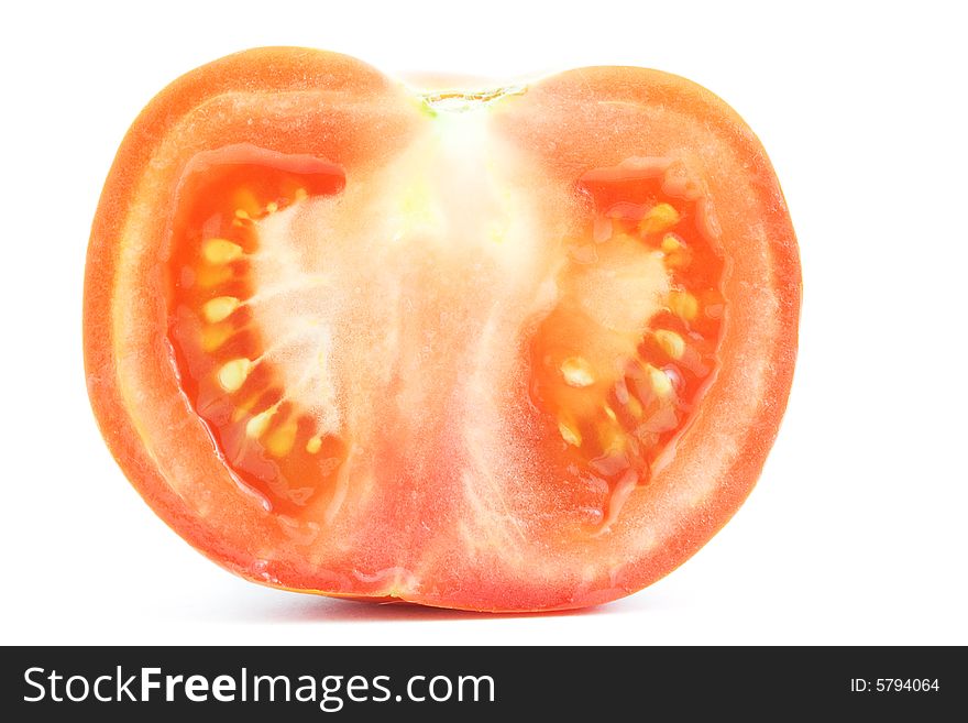 Isolated macro photo of cut of a tomato