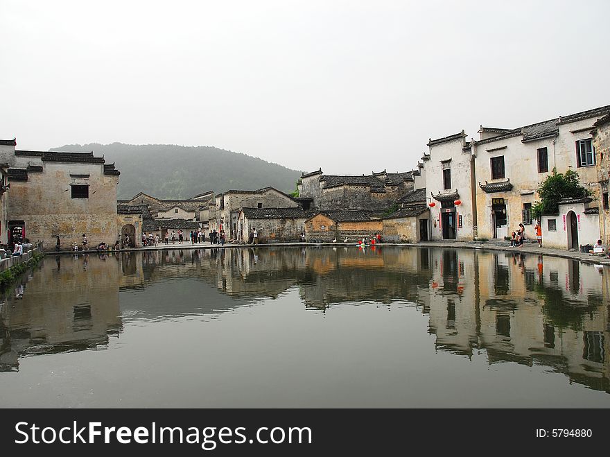 Hongcun, the world culture heritage of Anhui old villages of China, the tradition of Anhui civil houses are black tiles plus white brick walls. Nice comparison. Yue Zhao (moon lake) is in the middle of the village. Hongcun, the world culture heritage of Anhui old villages of China, the tradition of Anhui civil houses are black tiles plus white brick walls. Nice comparison. Yue Zhao (moon lake) is in the middle of the village.