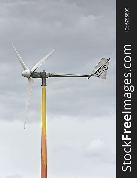 Wind turbine generating energy on a stormy day