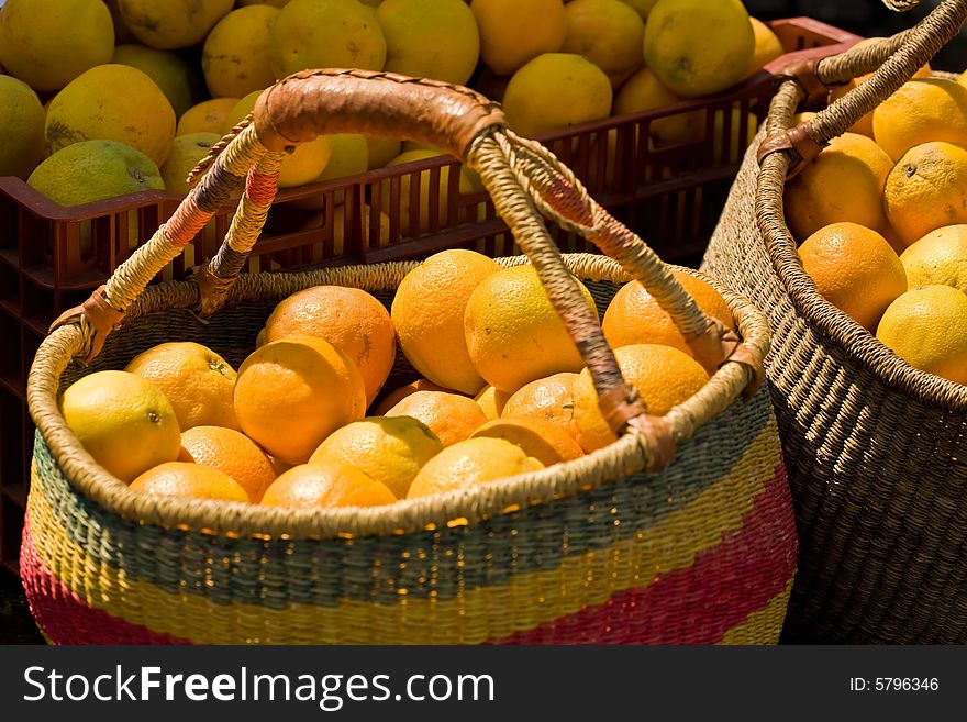 Baskets of oranges on farmers market