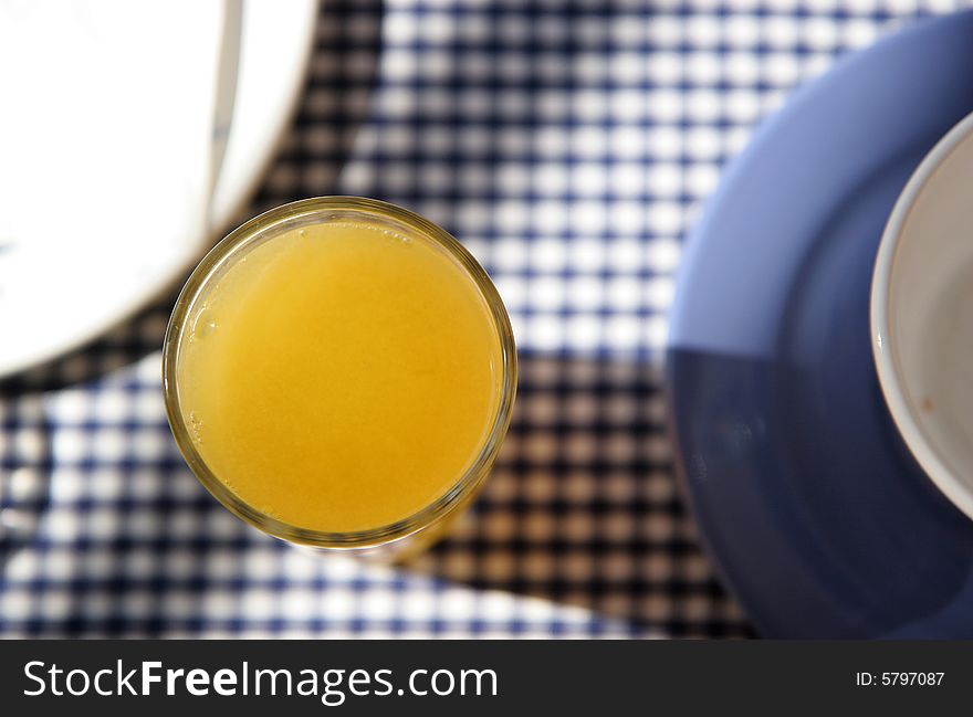 Breakfast table on sunny terrace, French Riviera, with juice