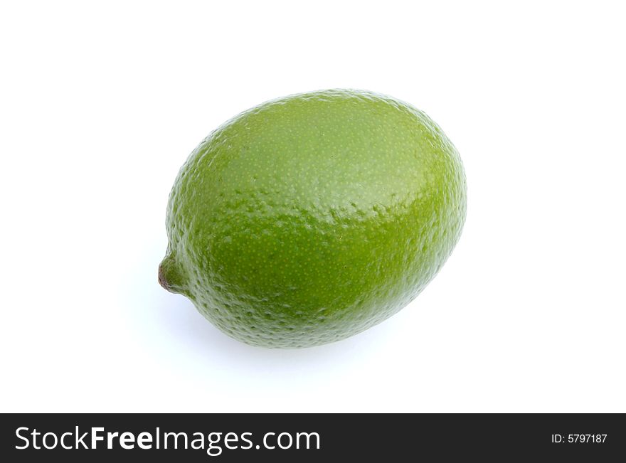 A photograph of a lime against a white background