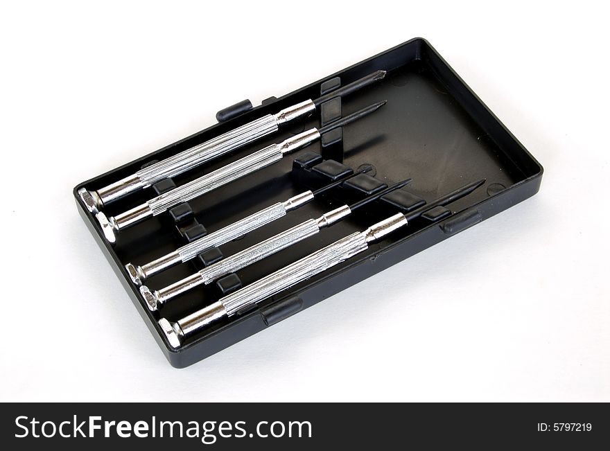 A photograph of a screw driver set against a white background