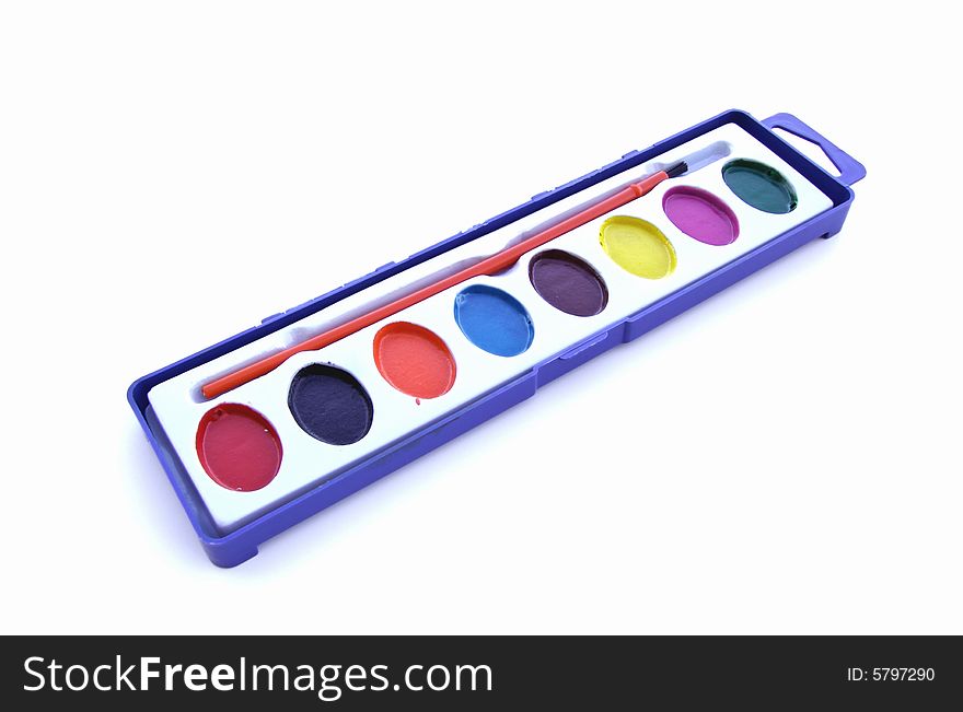 A photograph of a paint set against a white background