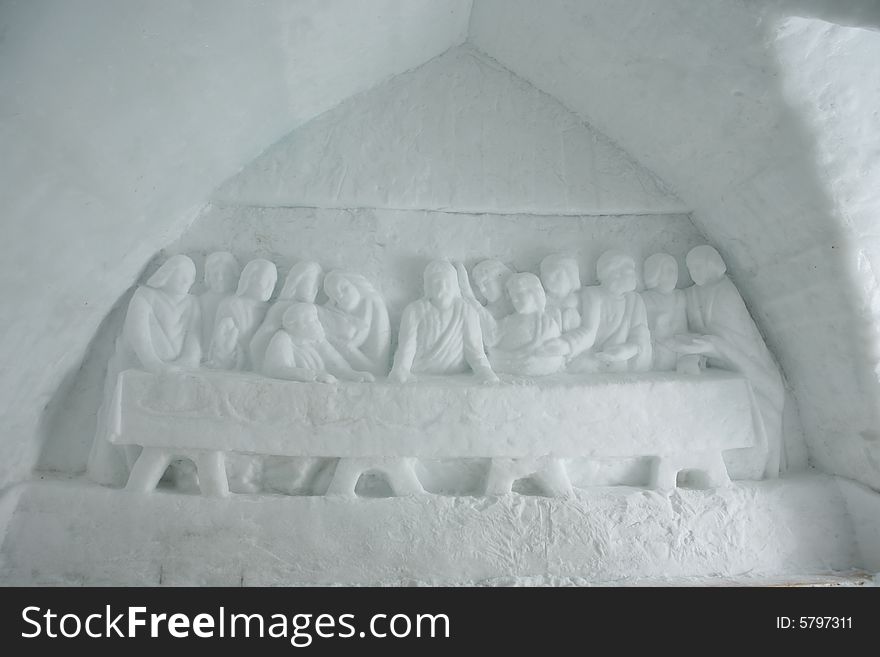 Jesus sculpted in ice in an ice church at Balea Lake, Fagarasi Mountains, Romania.  The Last Supper. Jesus sculpted in ice in an ice church at Balea Lake, Fagarasi Mountains, Romania.  The Last Supper