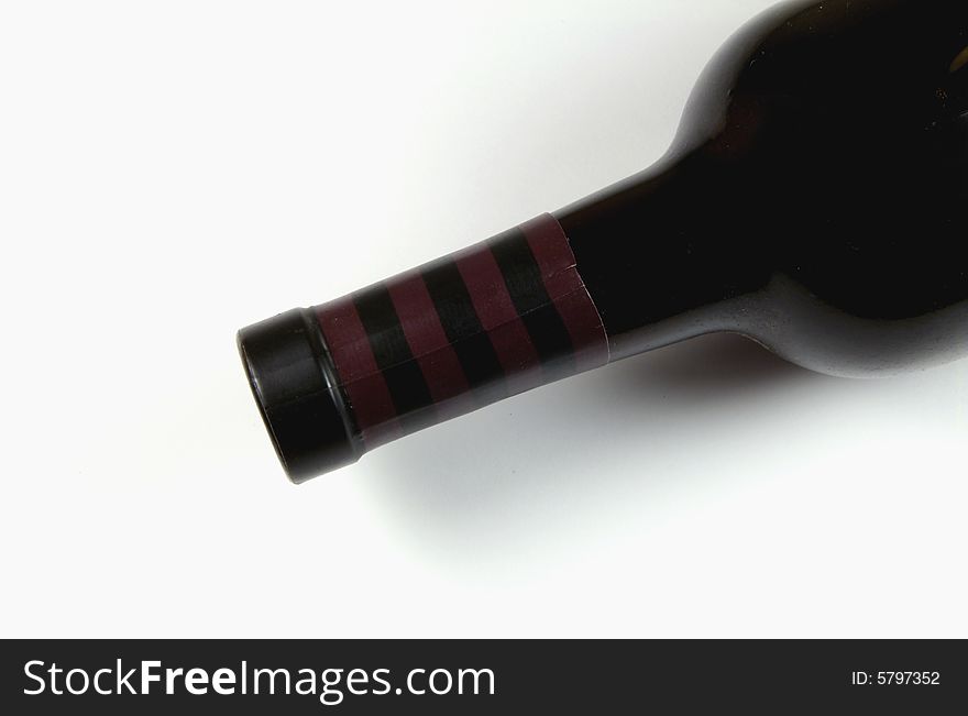 A photograph of a wine bottle against a white background