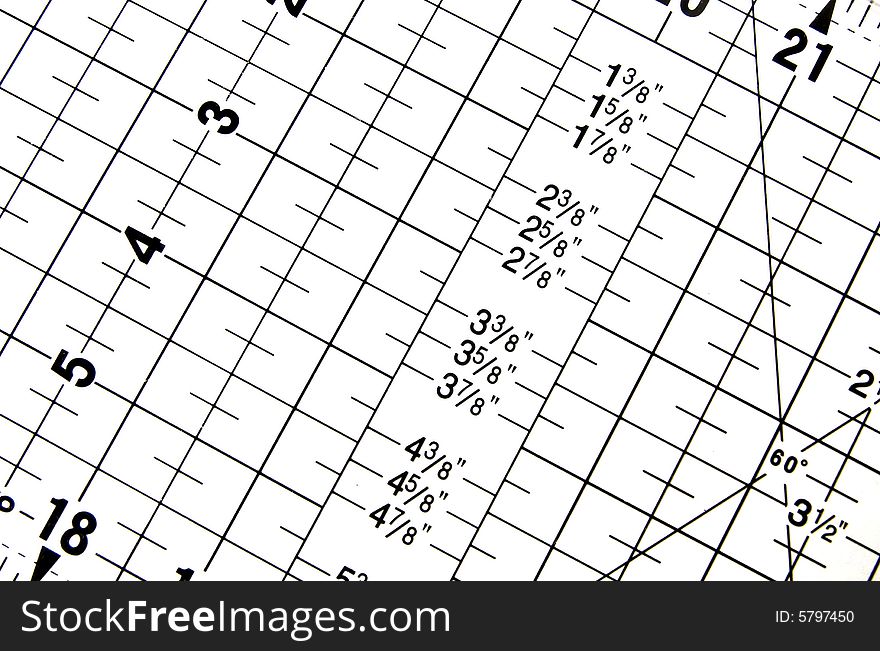 A photograph of a measuring square against a white background