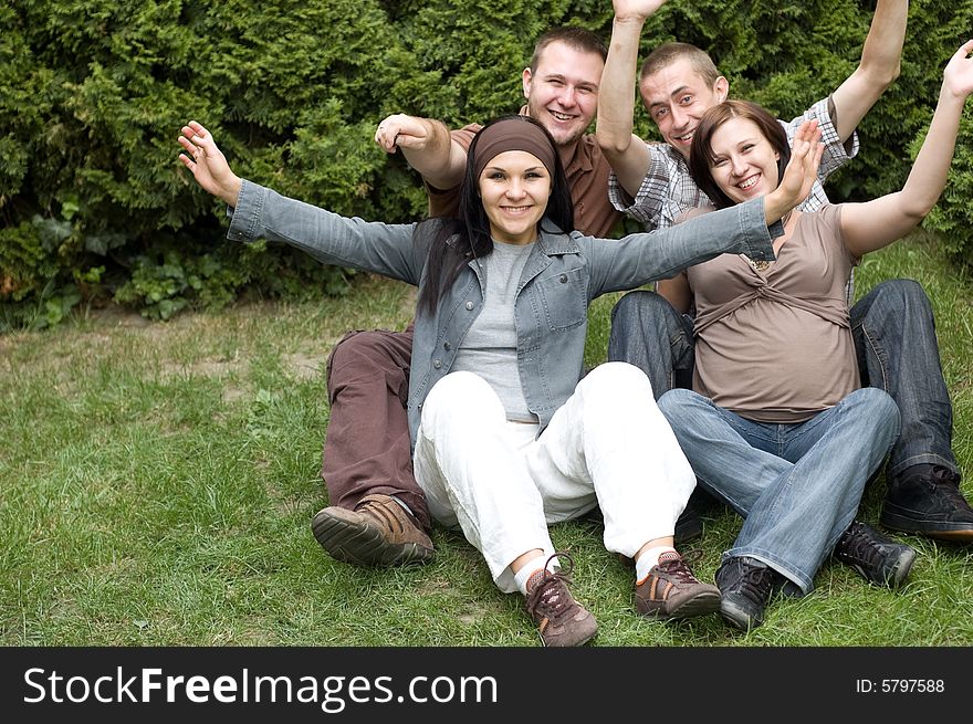 Friends together relaxing on grass. Friends together relaxing on grass