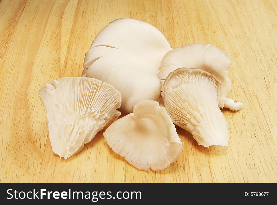 Oyster mushrooms on a wooden board