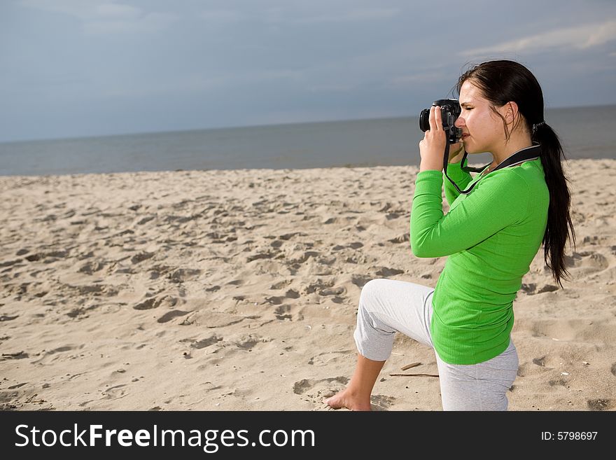 Attractive brunette woman on the beach. Attractive brunette woman on the beach