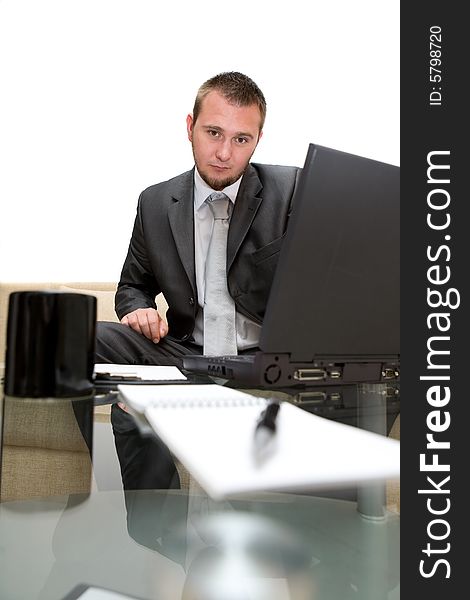 Happy man sitting on sofa with laptop. Happy man sitting on sofa with laptop