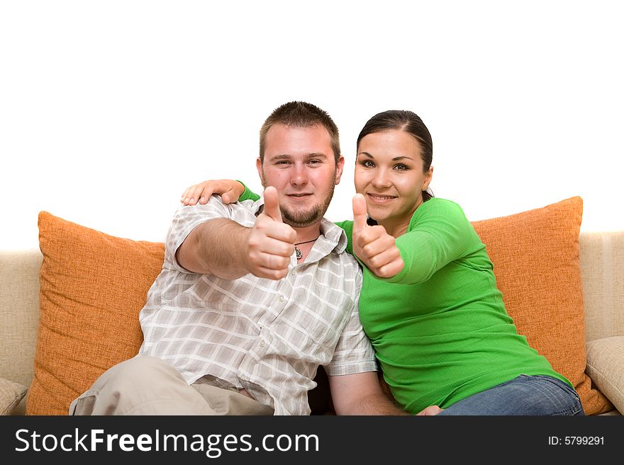 Happy family sitting on sofa. Happy family sitting on sofa