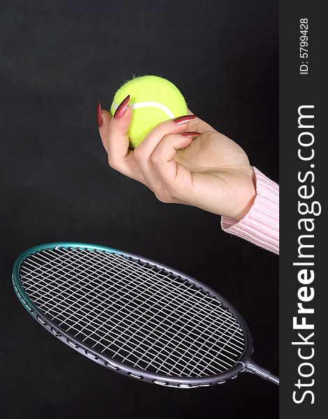 Racket and ball in woman  hand. Racket and ball in woman  hand