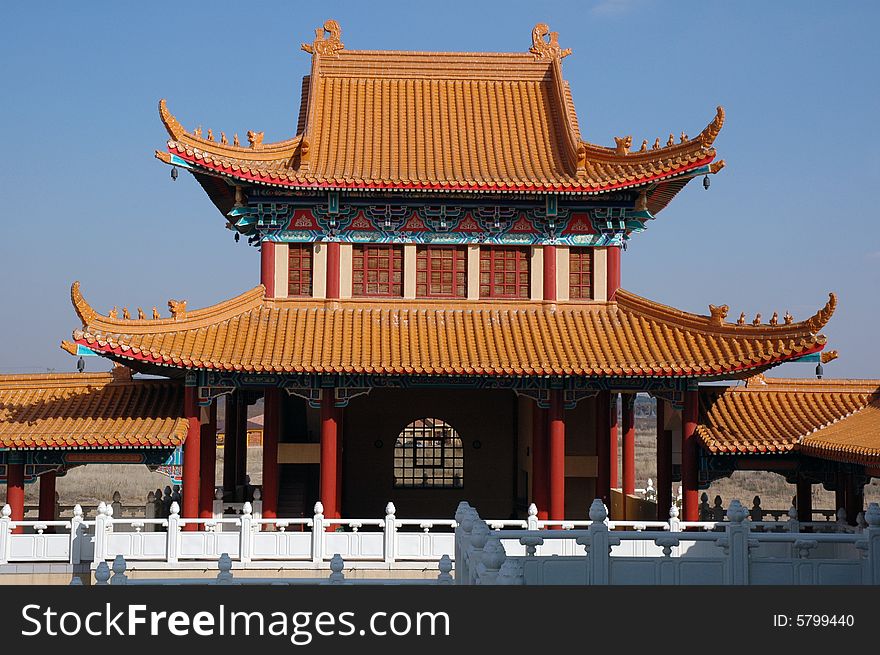 A photograph showing the detail of a Buddhist temple and Chinese architecture. A photograph showing the detail of a Buddhist temple and Chinese architecture.