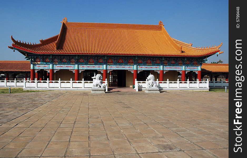 A photograph showing the detail of a Buddhist temple and Chinese architecture. A photograph showing the detail of a Buddhist temple and Chinese architecture.