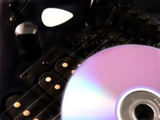 Electric Guitar CD And Pick Stock Photo Electric Guitar CD And Pick Stock Photo