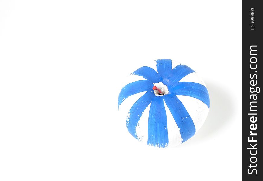 Isolated apple colored in blue and white, melting in the background. Overexposed. Isolated apple colored in blue and white, melting in the background. Overexposed.