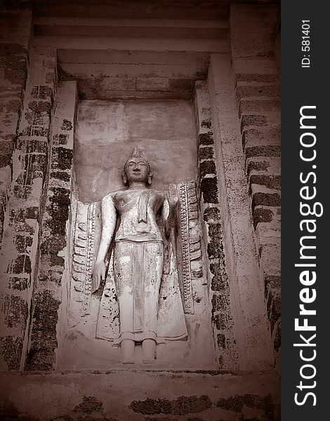 Buddha Carving on Wall found at Wat Ratchaburana