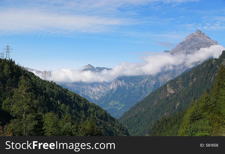 Panorama view on mountain peaks in Switzerland. Panorama view on mountain peaks in Switzerland.