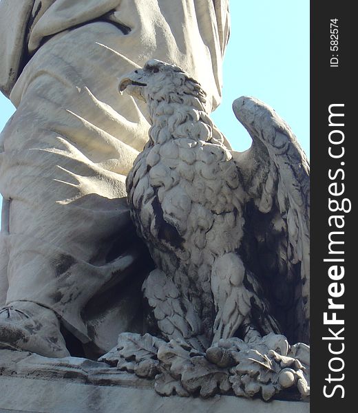 A detail of the eagle on the statue of Dante