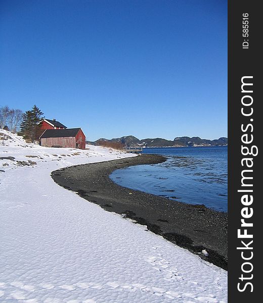 Norwegian bay by the fjord in winter. Norwegian bay by the fjord in winter