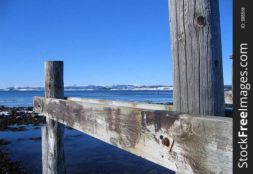 Side posts and cross bar by the fjord