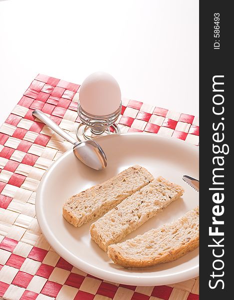 Bread in plate over white