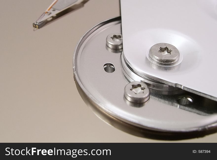 Detail of the inside of a computer hard disc unit. Detail of the inside of a computer hard disc unit