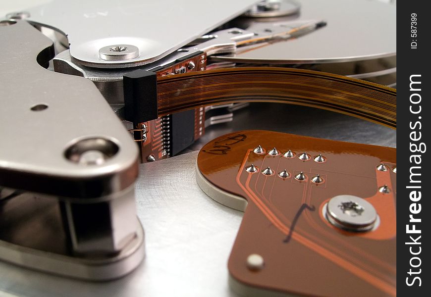 Detail of the inside of a computer hard disc unit. Detail of the inside of a computer hard disc unit