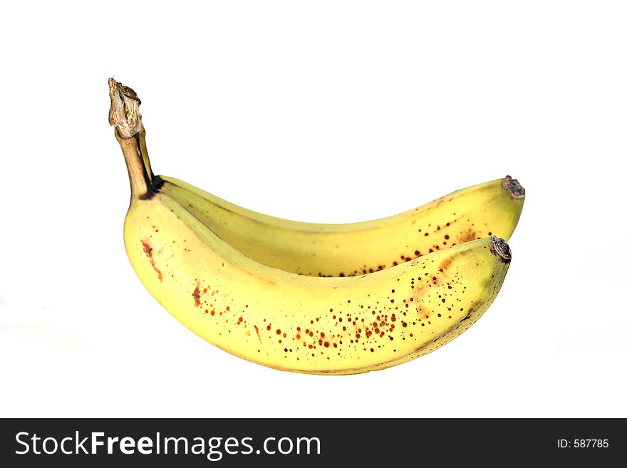 Yellow spotted bananas isolated on white background