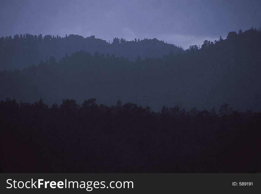 Ridges recede in the distance as the haze softens them. Ridges recede in the distance as the haze softens them