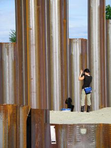 Girl Taking Pictures Of Metal Girders Royalty Free Stock Image Girl Taking Pictures Of Metal Girders Royalty Free Stock Image