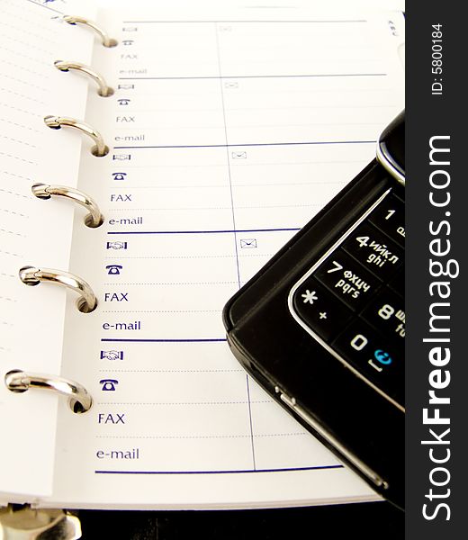 Notebook On Financial Paper telephone mobile fax. Notebook On Financial Paper telephone mobile fax