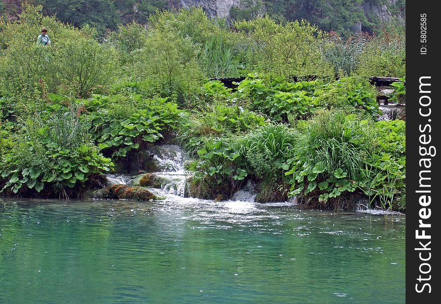 Small waterfall on the forest spring in Plitwitz lake National Park, Croatia. Small waterfall on the forest spring in Plitwitz lake National Park, Croatia