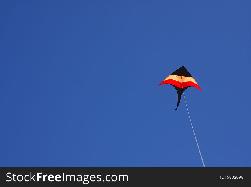 Colorful Kite Flying In The Sky