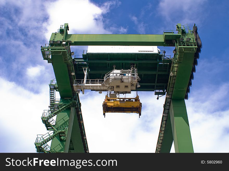 Huge modern port operating machines in one of the busiest port in Asia. Huge modern port operating machines in one of the busiest port in Asia.