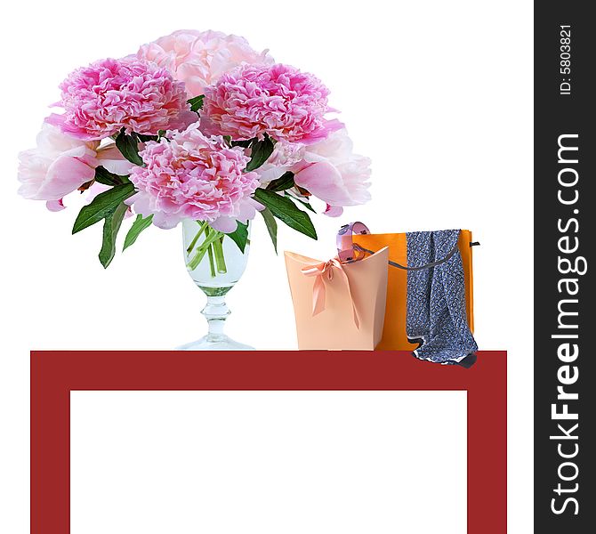 Peony and shopping bags with accessoires on the table