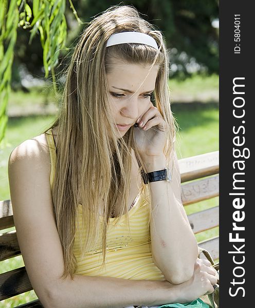 Girl calling by phone outdoor. Girl calling by phone outdoor