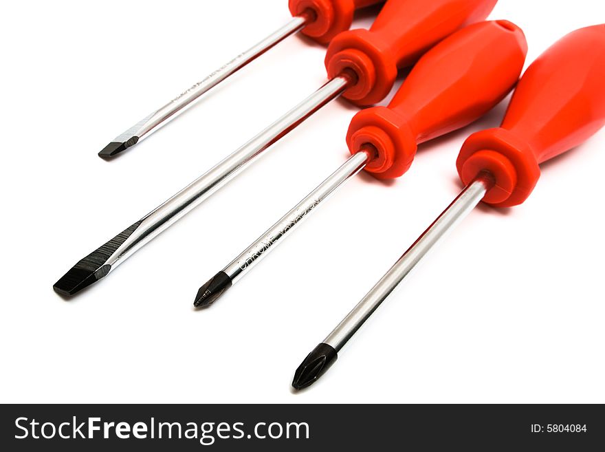 Set of steel screwdrivers on a white background