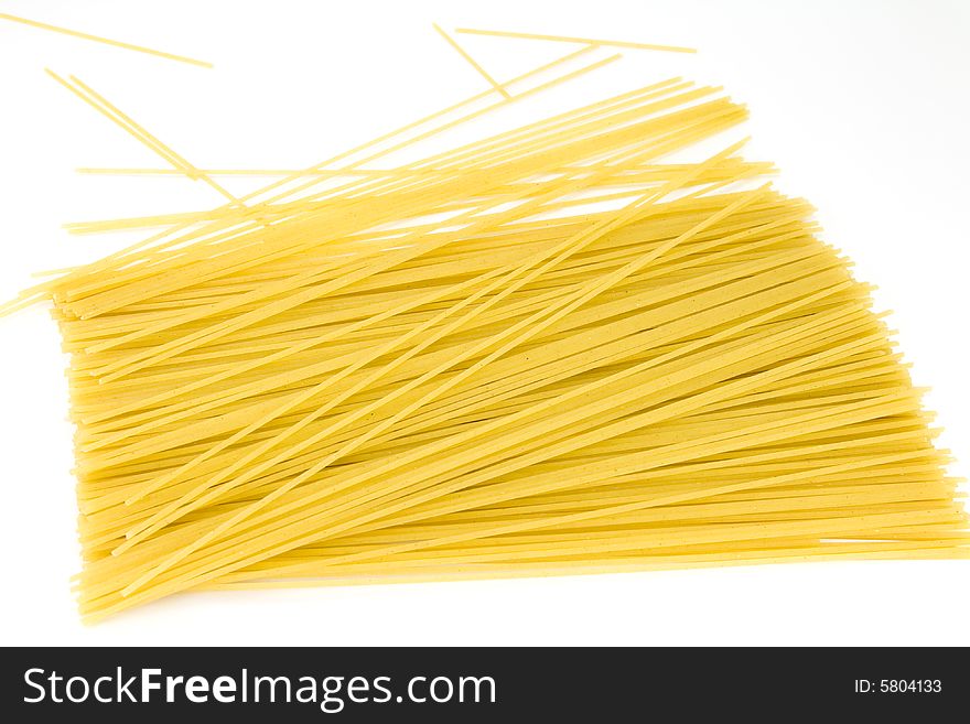 Some yellow macaroni isolated on white