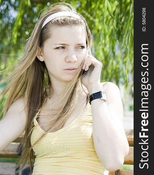 Girl calling by phone outdoor