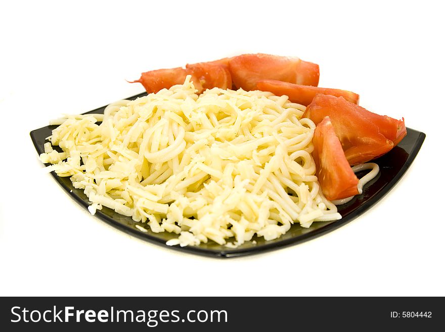 Macaroni and tomatoes on plate