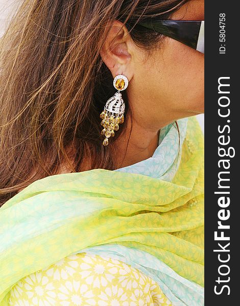 Close-up of a woman at a traditional Indian wedding ceremony. Close-up of a woman at a traditional Indian wedding ceremony.