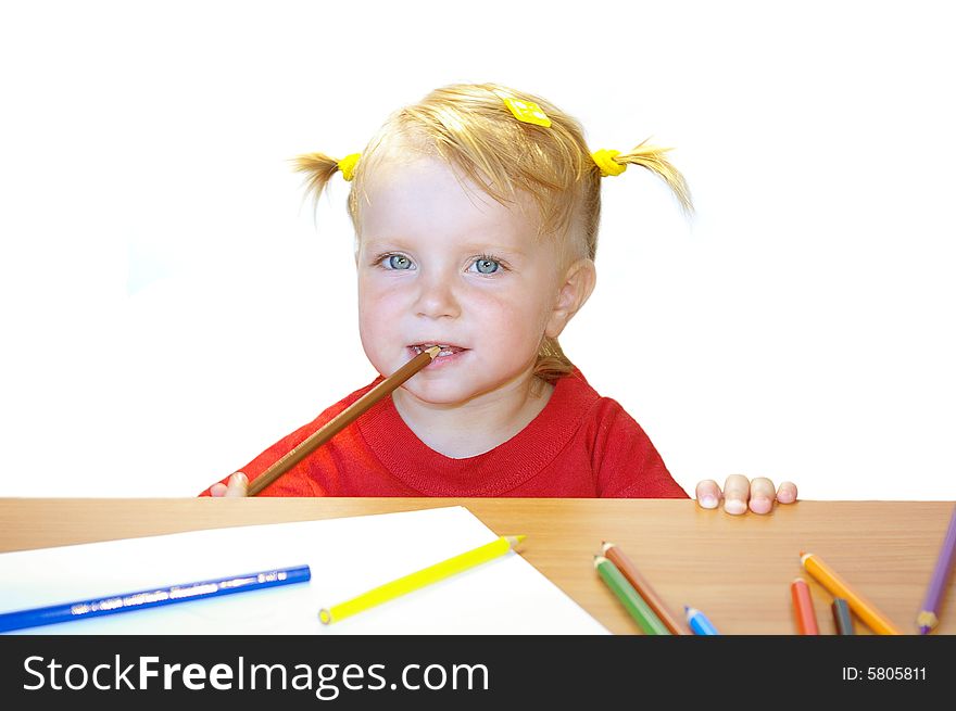 Cute little girl and color pencils isolated on white