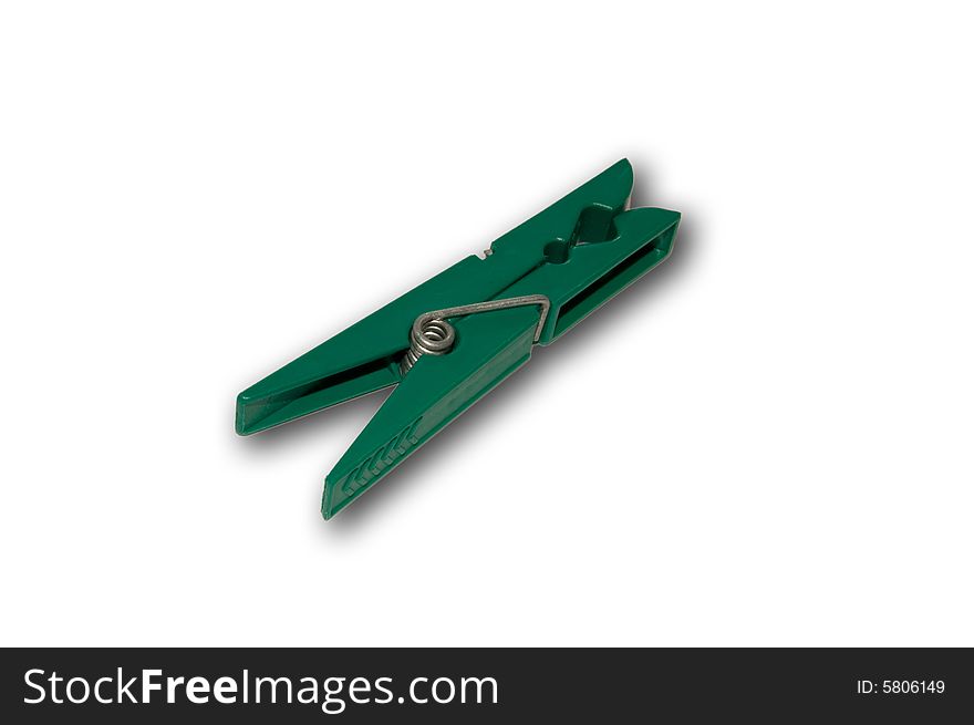 Ordinary green plastic pegs for linen