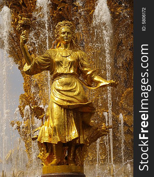 Golden statue in moscow fountain of Friendship of Peoples. Golden statue in moscow fountain of Friendship of Peoples