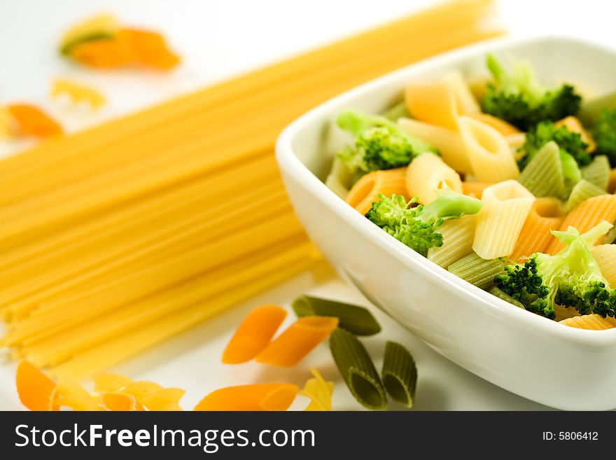 Italian noodles in bowl, Few kinds of pasta on white background