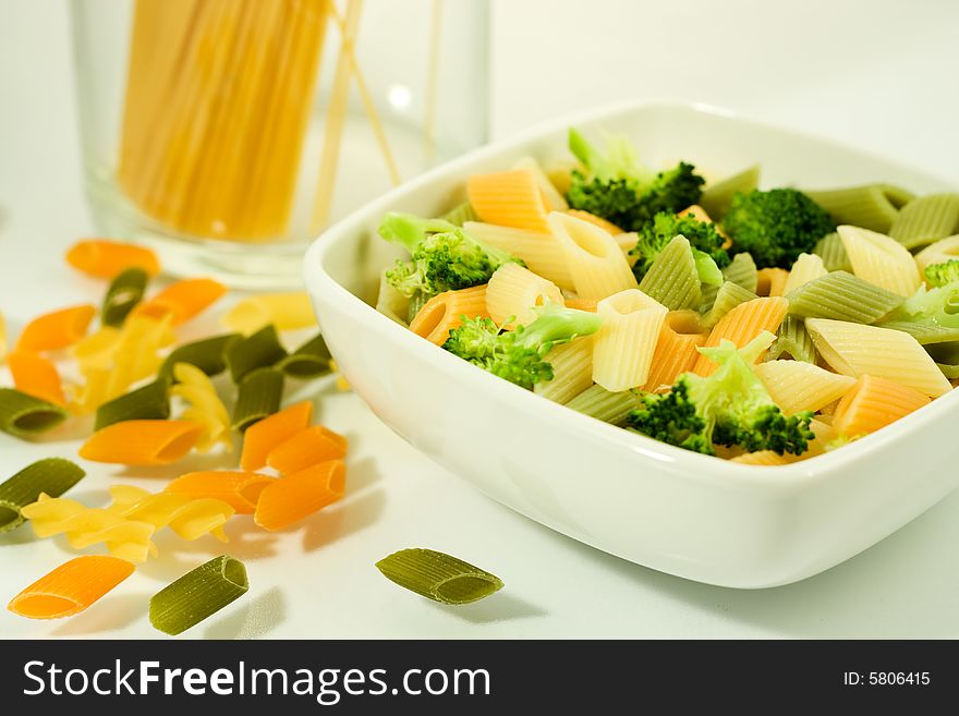 Italian noodles in bowl, Few kinds of pasta on white background